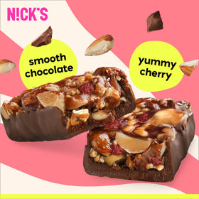N!CK'S Keto Nut Bar close-up showing cherries, nuts, and chocolate texture