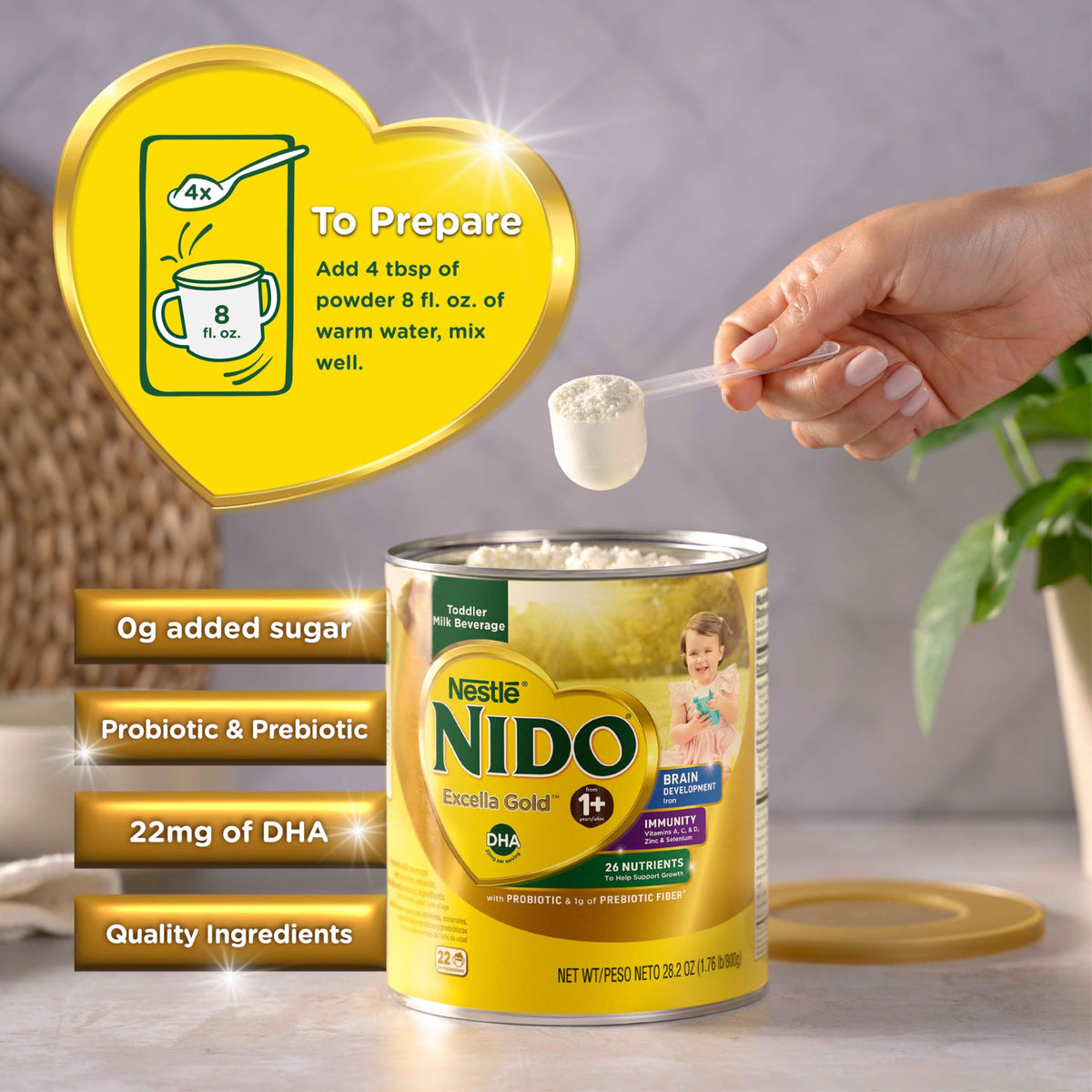 Nido Excella Gold being mixed with warm water for a creamy drink