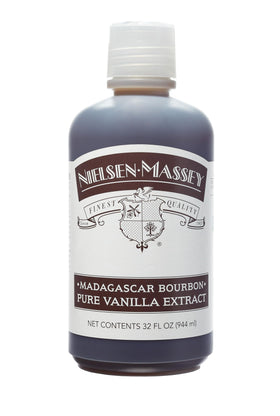 Nielsen-Massey Madagascar Bourbon Vanilla Extract bottle on kitchen counter, premium baking flavor.