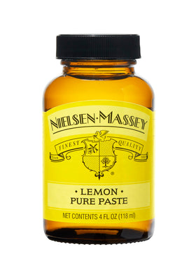 Nielsen-Massey Pure Lemon Paste bottle close-up highlighting bright citrus for glazes and frostings.