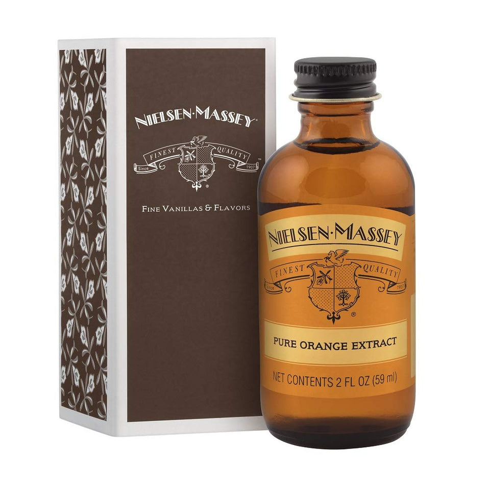 Nielsen-Massey Pure Orange Extract bottle on shelf ready for baking