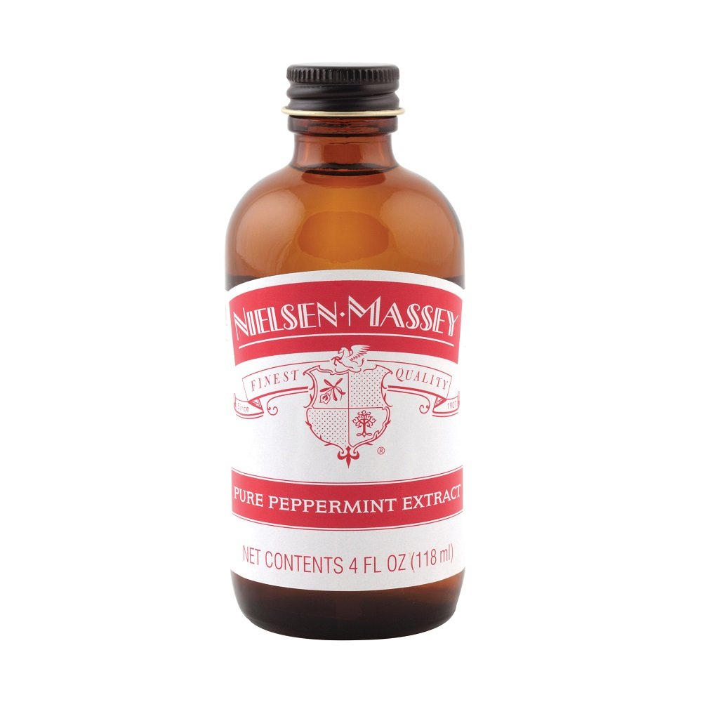 Close-up of the label showing all-natural, kosher-certified quality in the extract.