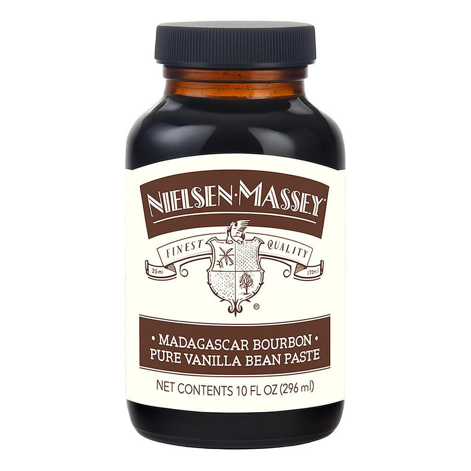 Nielsen-Massey Vanilla Bean Paste bottle close-up shows real specks for authentic flavor.