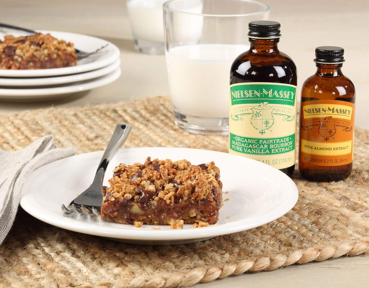 Nielsen-Massey vanilla extract in kitchen scene, ideal for desserts.
