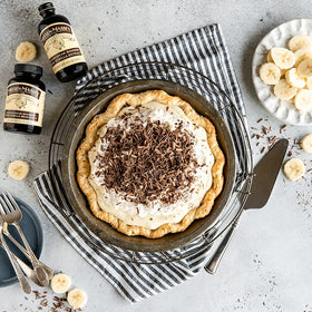 Nielsen-Massey vanilla extract poured into batter for aroma
