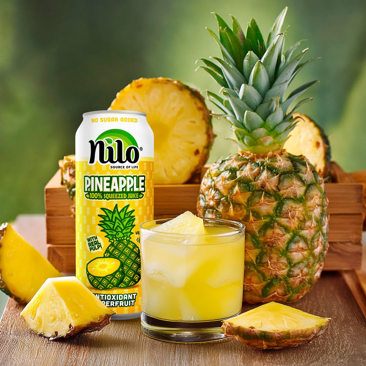 NILO Pineapple Juice not from concentrate bottle, farm-fresh taste.