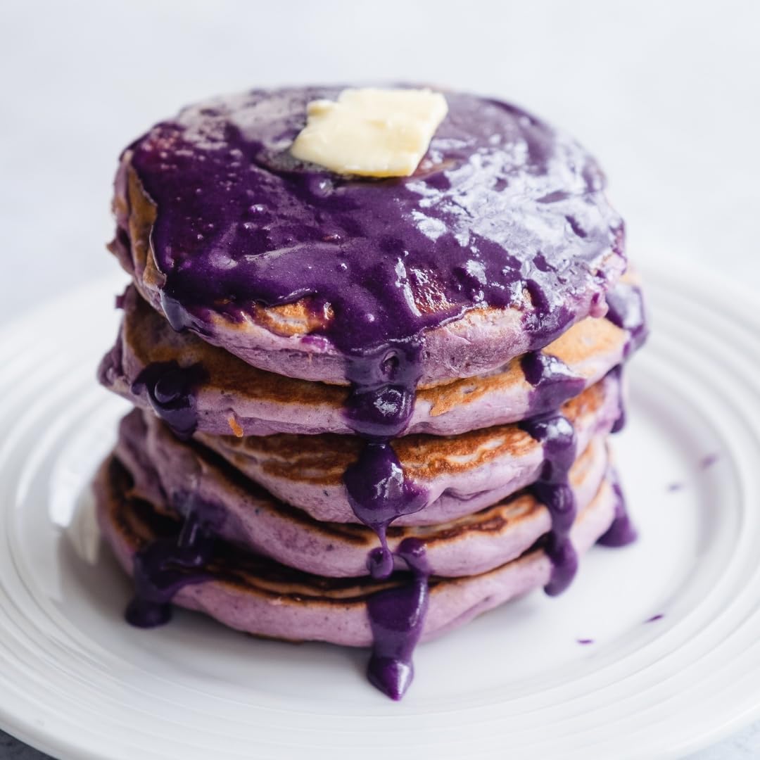 Crepes prepared with Ninong’s Ube Pancake Mix for a tasty twist.