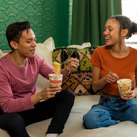 Nissin Cup Noodles Curry ingredients visible, ideal for a fast snack
