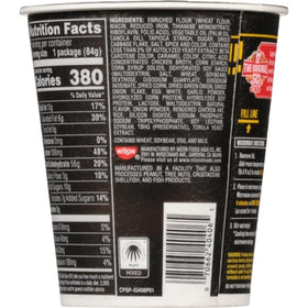 Nissin Cup Noodles Stir Fry Fiery Chicken noodles close-up with bold chili flakes.