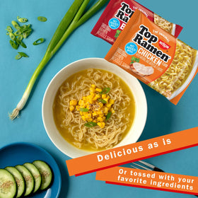 NISSIN Top Ramen noodles boiling in a pot, ready in three minutes.