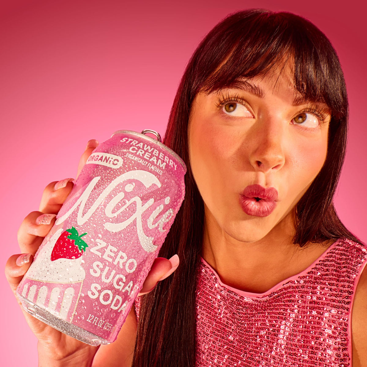 Nixie bubbles close-up emphasizes light, caffeine-free sparkling refreshment