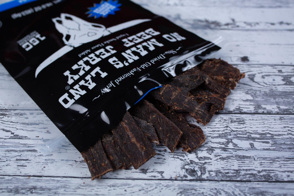 No Man's Land Beef Jerky Black Pepper serving image highlighting clean ingredients.