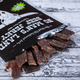 No Mans Land Fajita Lime beef jerky packaging highlighting gluten-free claim.