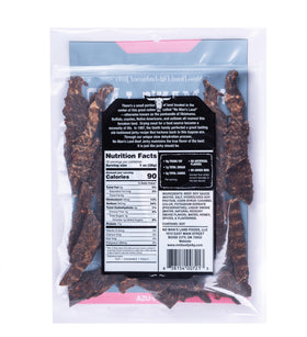 No Mans Land jerky strips close-up shows spicy seasoning and chewy texture.
