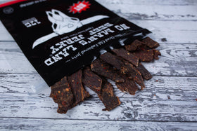 No Mans Land protein jerky portion highlights 17g protein per bag for active lifestyles.
