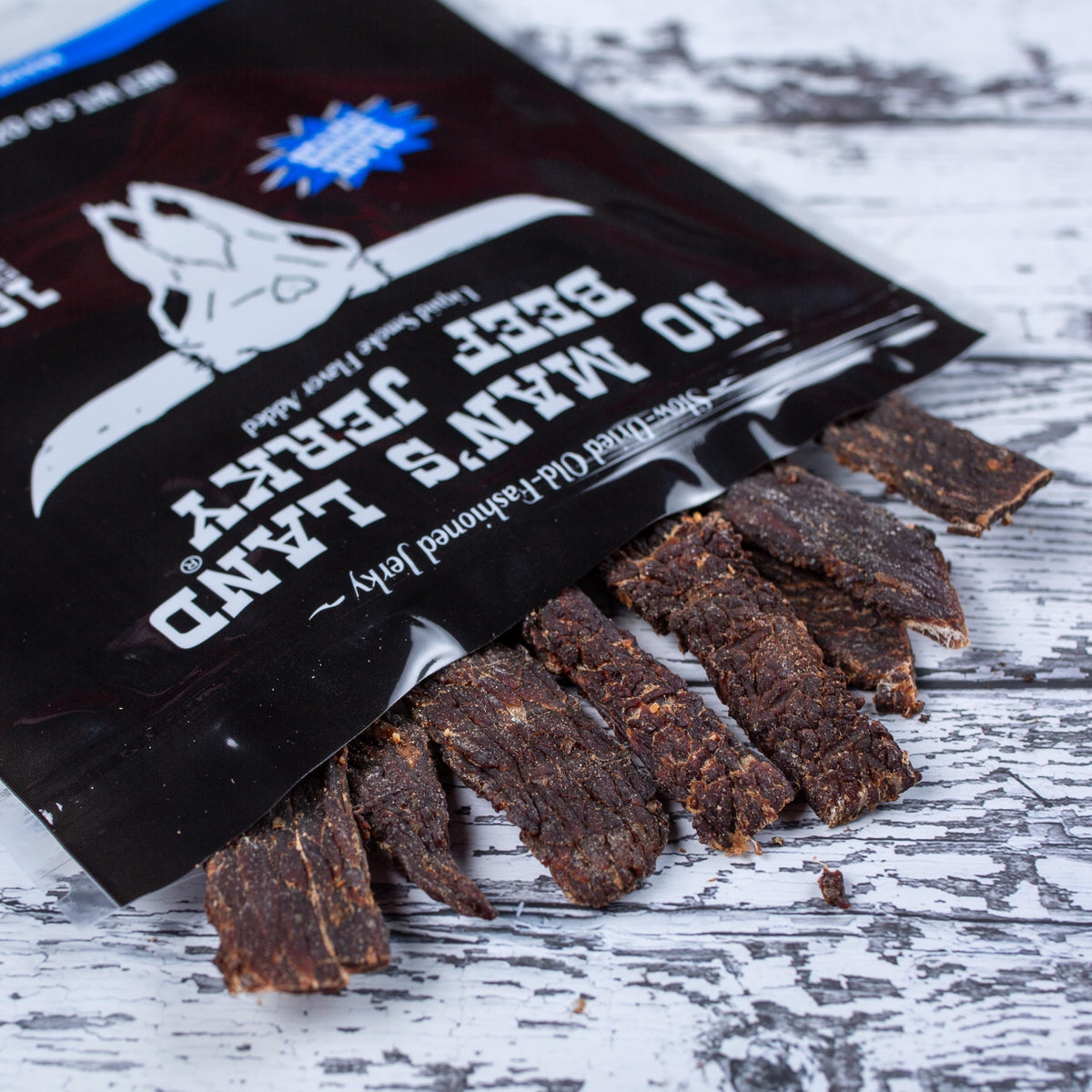 No Mans Land slow-dried jerky process creates rich, smoked aroma and chew.