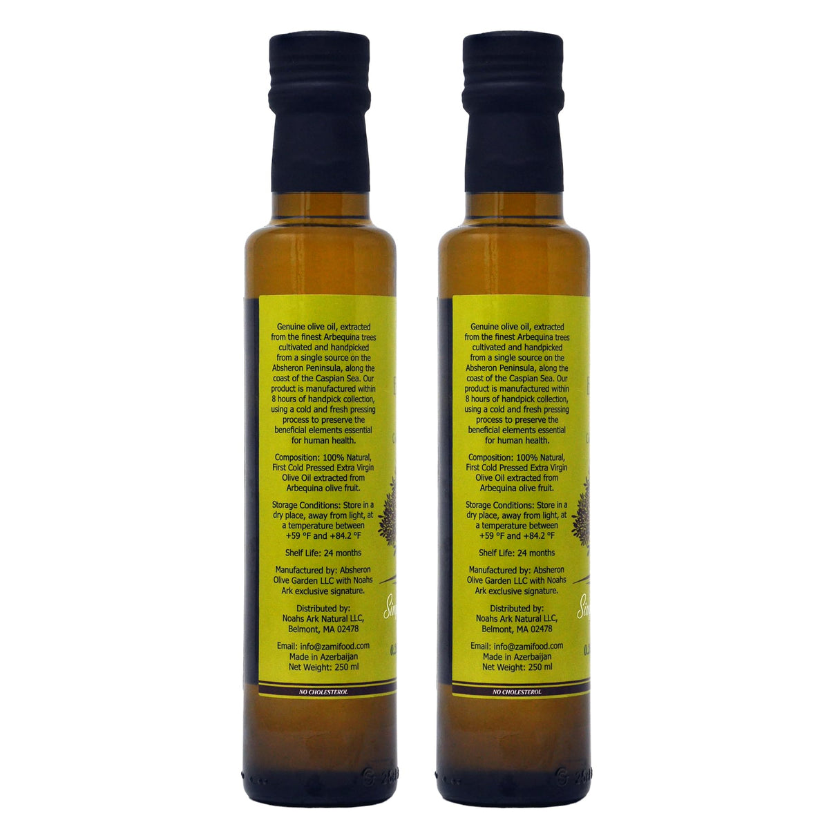 Noah`s Ark olive oil bottle being poured over a fresh salad.
