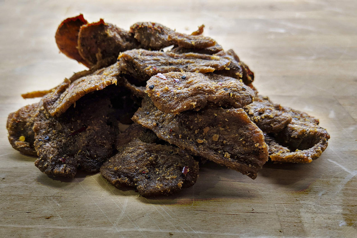 Noble Jerky Original hero shot emphasizes bold flavor and protein.