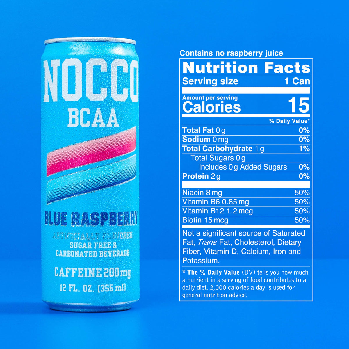 Pouring NOCCO Blue Raspberry into a glass with fizz and color