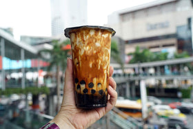 Nokchawon Cafe Base Syrup latte with creamy foam ready to sip.