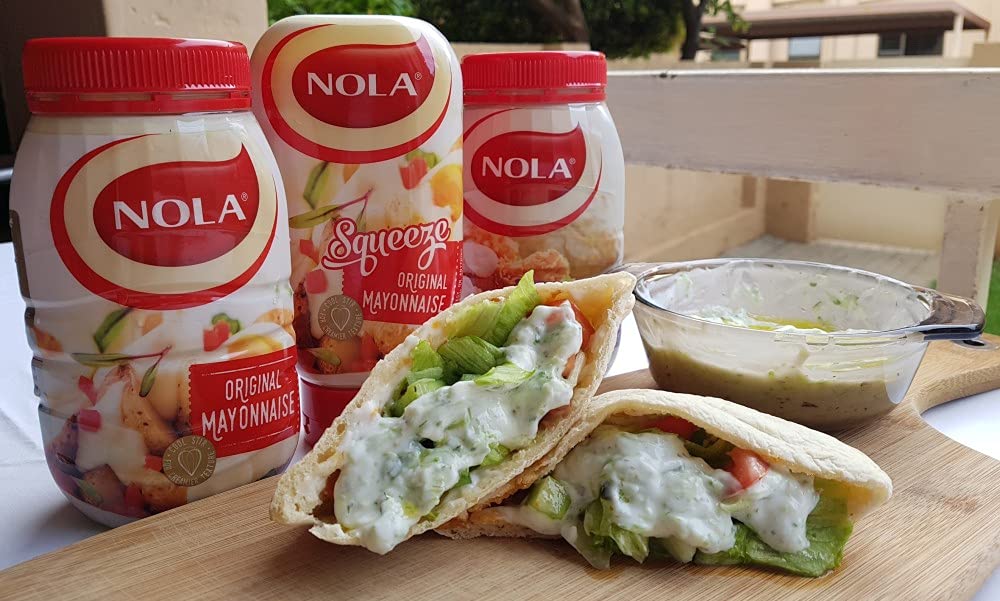 Nola mayonnaise bottle pour demonstrates smooth flow for sandwiches and salads.