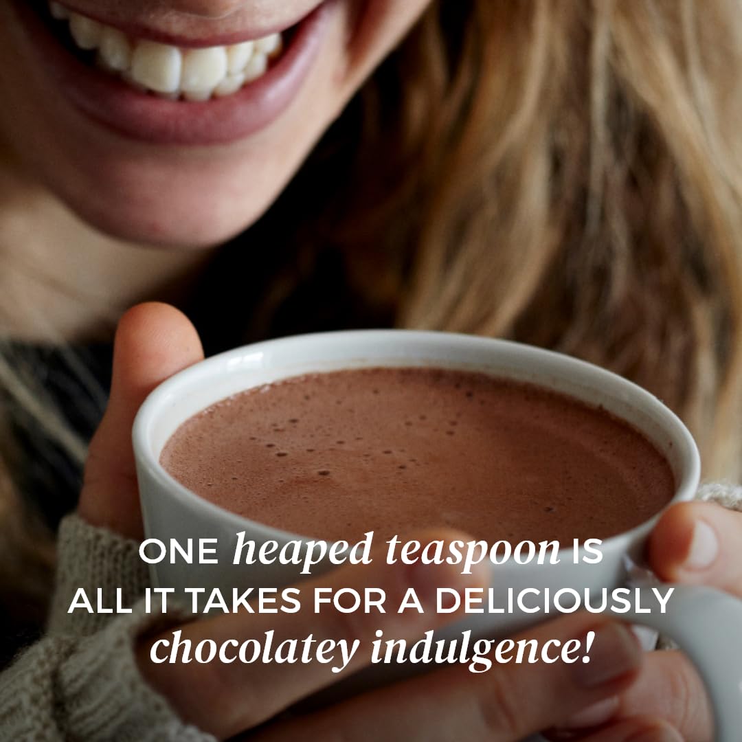 NOMU Skinny hot chocolate stirring mug ready for a comforting drink.