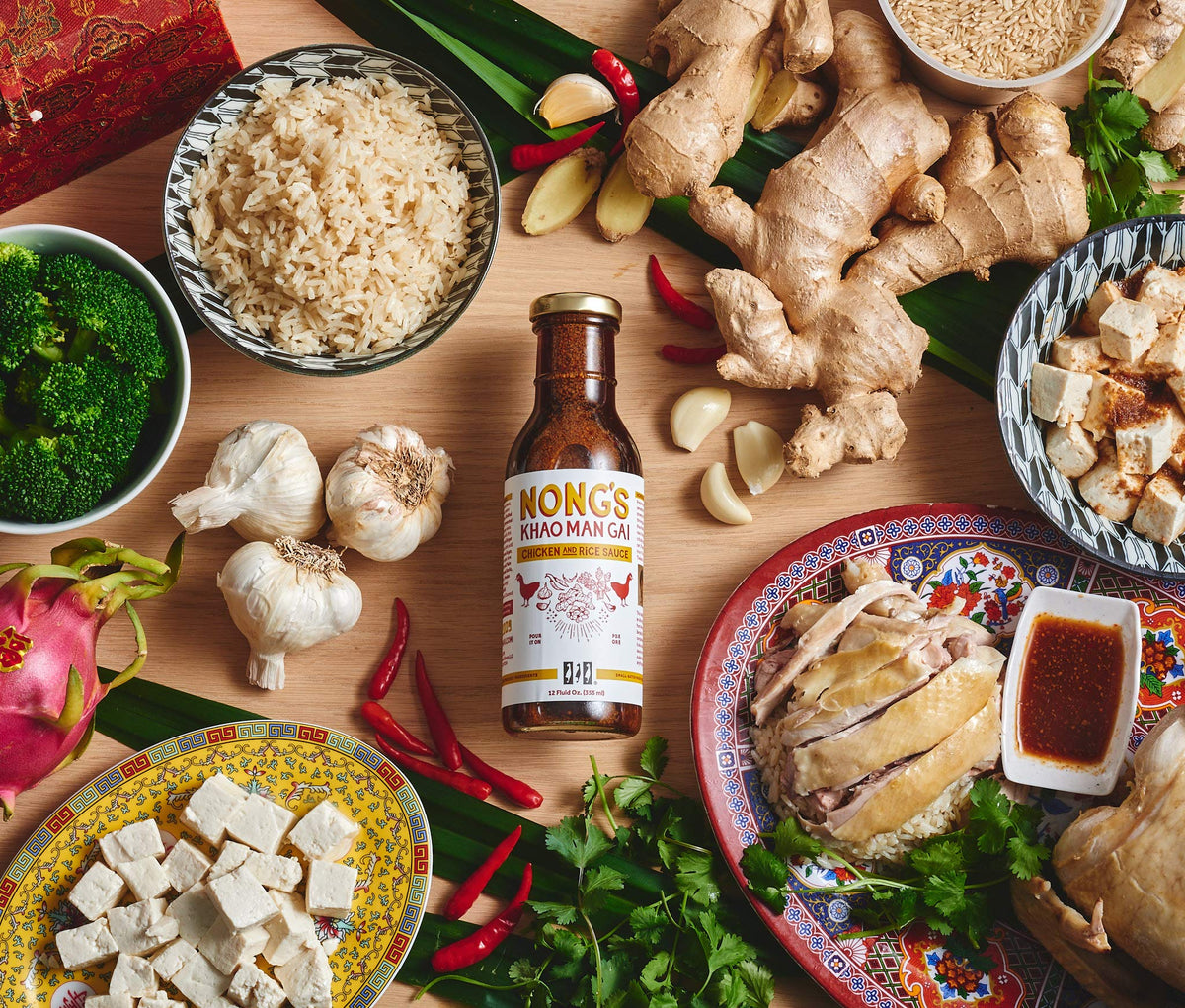 Nong's Khao Man Gai sauce on a diner-style bowl highlighting versatility.