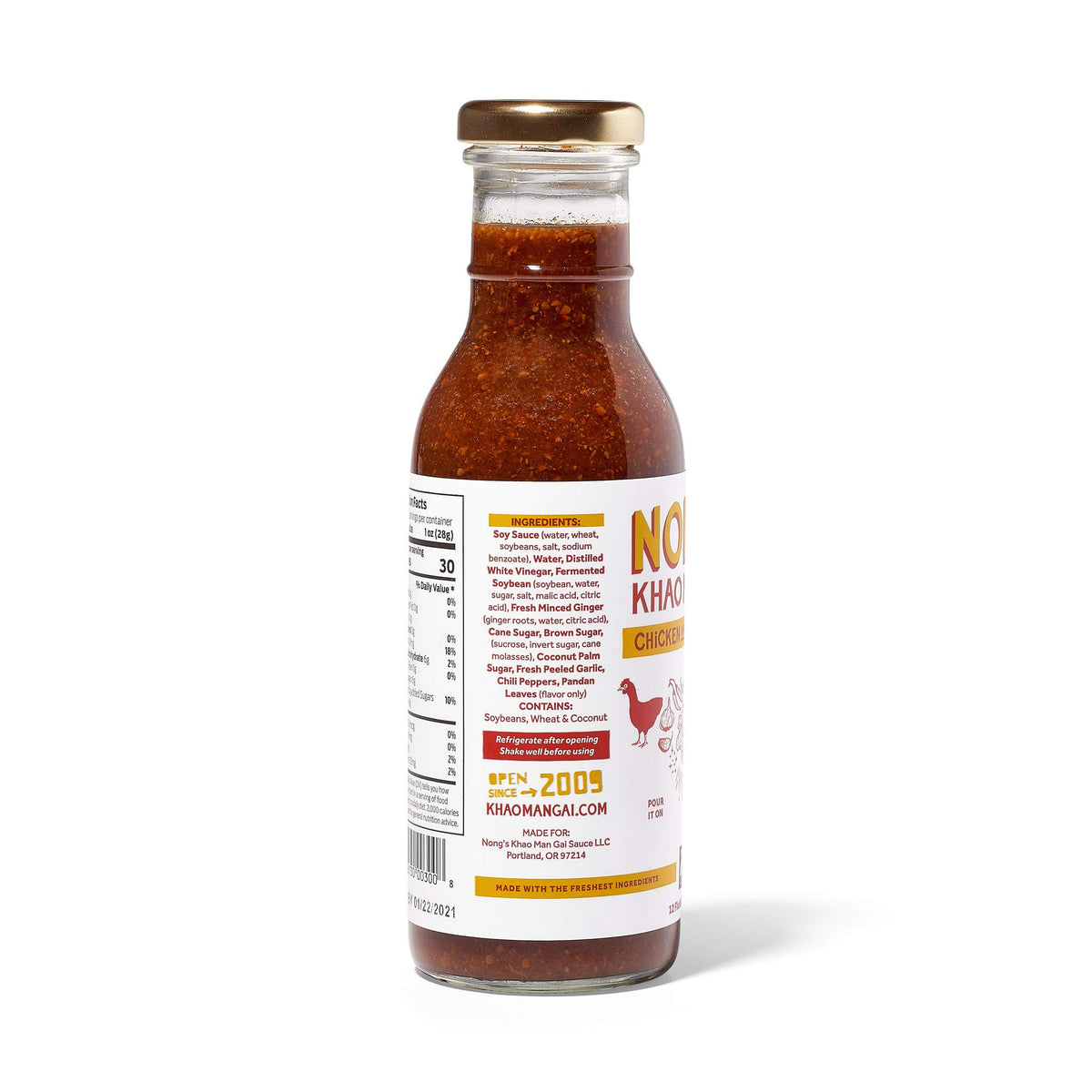 Nong's Khao Man Gai sauce ingredients shot featuring fresh ginger and garlic for vibrant flavors.
