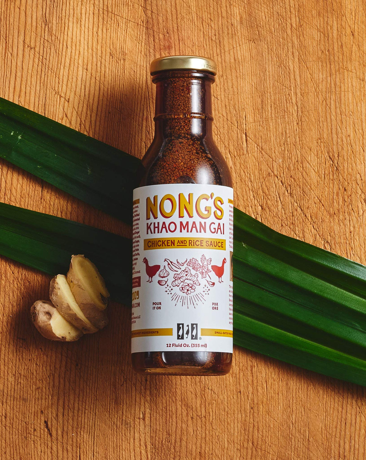 Nong's Khao Man Gai sauce marinade scene ready to elevate bowls.