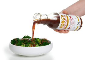 Nong's Khao Man Gai sauce bottle labeled USA-made close-up.