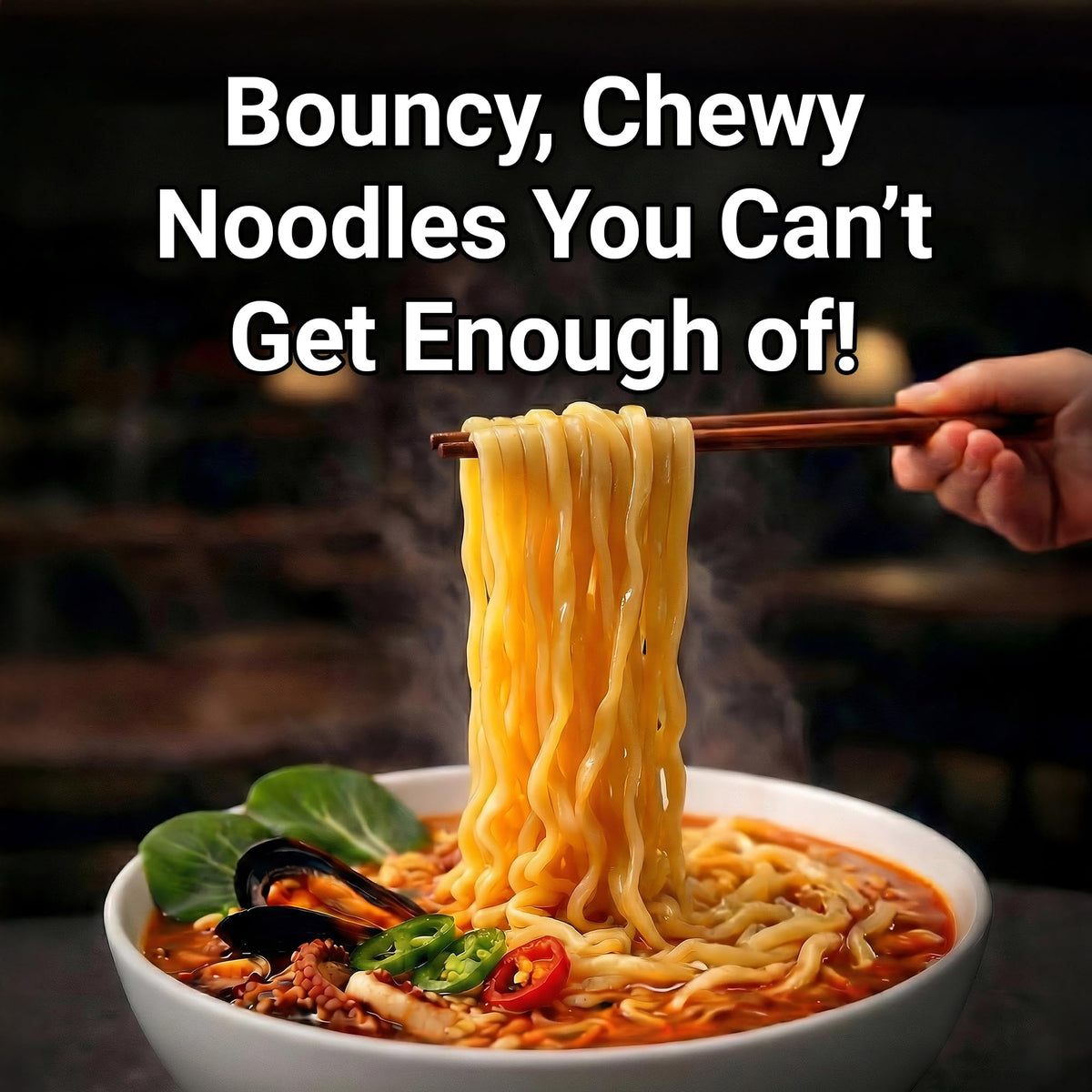 Nongshim Champong Ramyun noodles-texture visual, thick, chewy strands in spicy broth