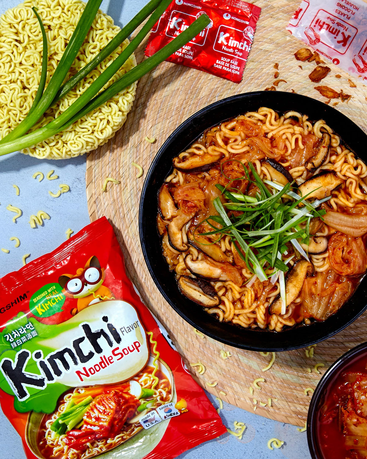Nongshim dried kimchi flakes close-up adding aroma and texture.