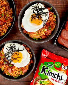 Nongshim kimchi broth base highlighting spicy, tangy flavor profile.
