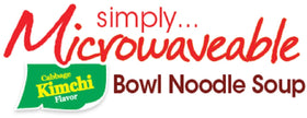 Nongshim ramen bowl with sauce packet and vegetables ready to mix.