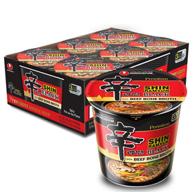 Nongshim Shin Black noodles in a bowl showcasing rich texture and spicy aroma.