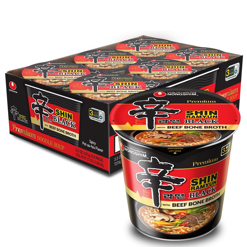 Nongshim Shin Black noodles in a bowl showcasing rich texture and spicy aroma.
