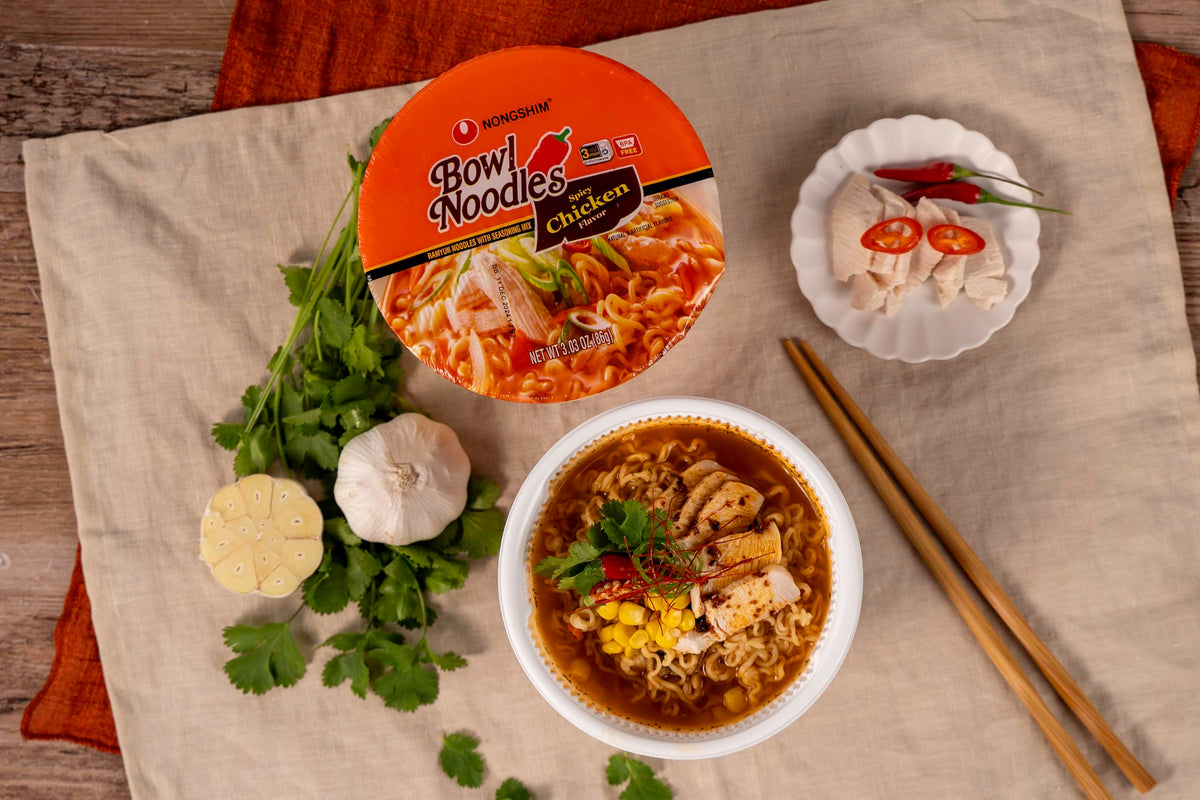 Nongshim Spicy Chicken Noodle Soup microwave-safe bowl enables quick heat.