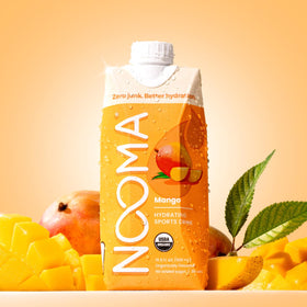 NOOMA Mango pour showing quick hydration during workouts.