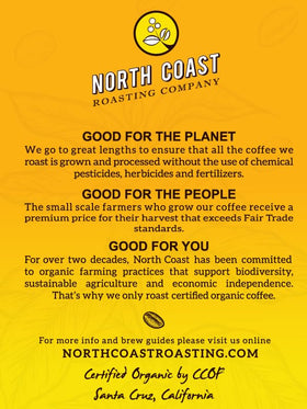 Steaming cup of North Coast Roasting Ultra Dark coffee