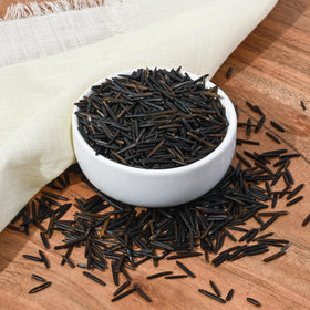 Northern Latitude Foods cooked wild rice served steaming as a versatile side.