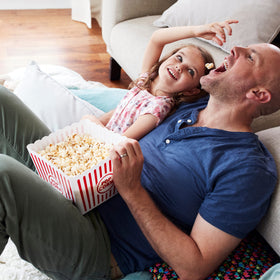 Nostalgia Theater Popcorn Kit ready-to-serve setup for family movie night.