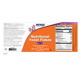 NOW Foods Nutritional Yeast Flakes closeup of golden flakes ideal for sprinkling.