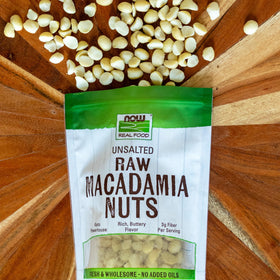 NOW Foods raw macadamias packaging close-up, USA-made in a family-owned facility.