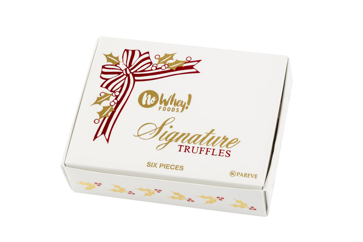 No Whey! Signature Truffle Collection close-up showing six vegan flavors and allergen-friendly indulgence.