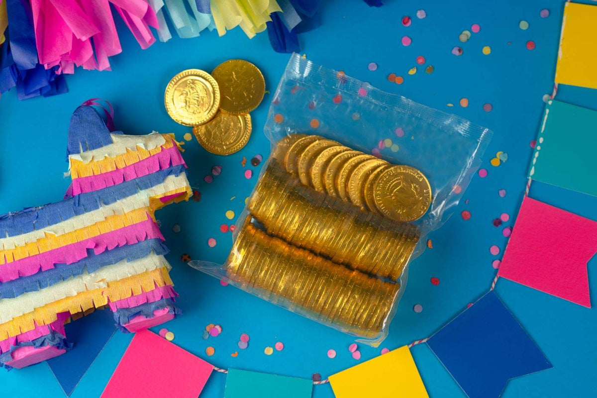 NUCITA Monedas Gold Bags coins unwrapped reveal glossy wrappers and ready-to-share treats