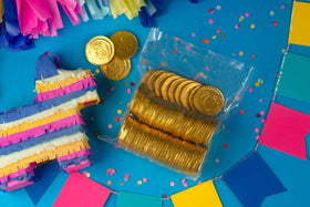 NUCITA Monedas Gold Bags coins unwrapped reveal glossy wrappers and ready-to-share treats
