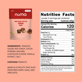 Numa Mini Peanut Butter Cocoa Bars cross-section reveals crunchy peanuts and cocoa.