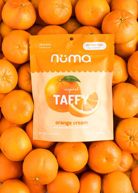 Active lifestyle scene with Numa Taffy in a gym bag.