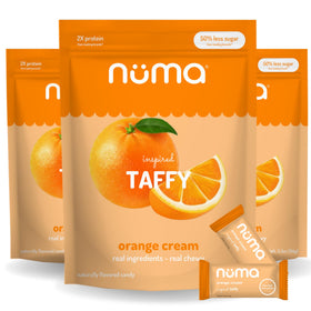 Numa Taffy Orange Cream packaging highlights simple ingredients and bold flavor.