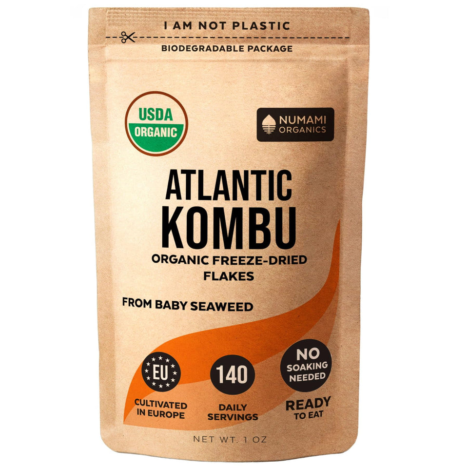 Numami Organic Kombu Flakes bottle pour, convenient flavor boost for quick meals.